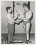 Weight Lifter Receiving Trophy, undated by Franklin University