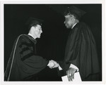 Graduate Shaking Hands with Frasch, 1971 by Franklin University