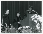 Elijah Pierce Stands at Podium, 1980 by Franklin University