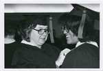 Graduate Fixes Another's Gown, 1980