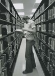 Student Browsing Books, 1970s by Franklin University
